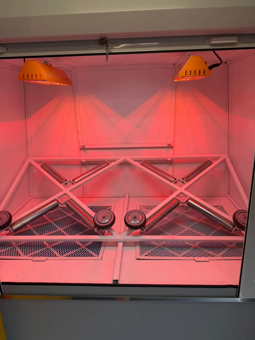 Specialist cabinet with internal lamps and racking installed in a van